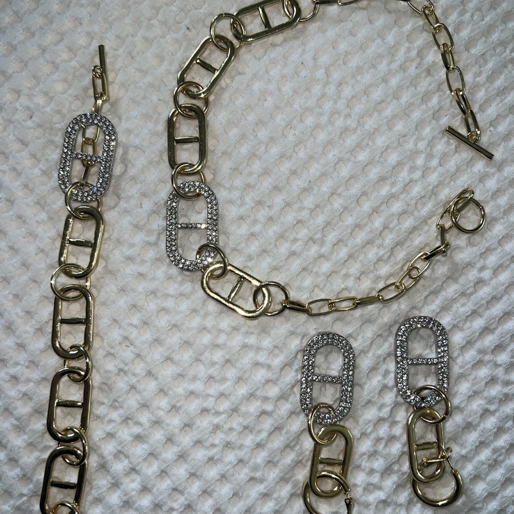 Emma Pills gold necklace, bracelet and earring set